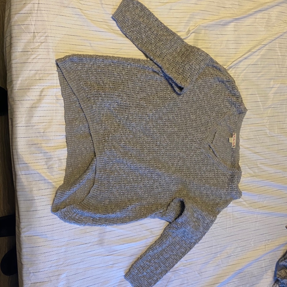Grey knitted sweater